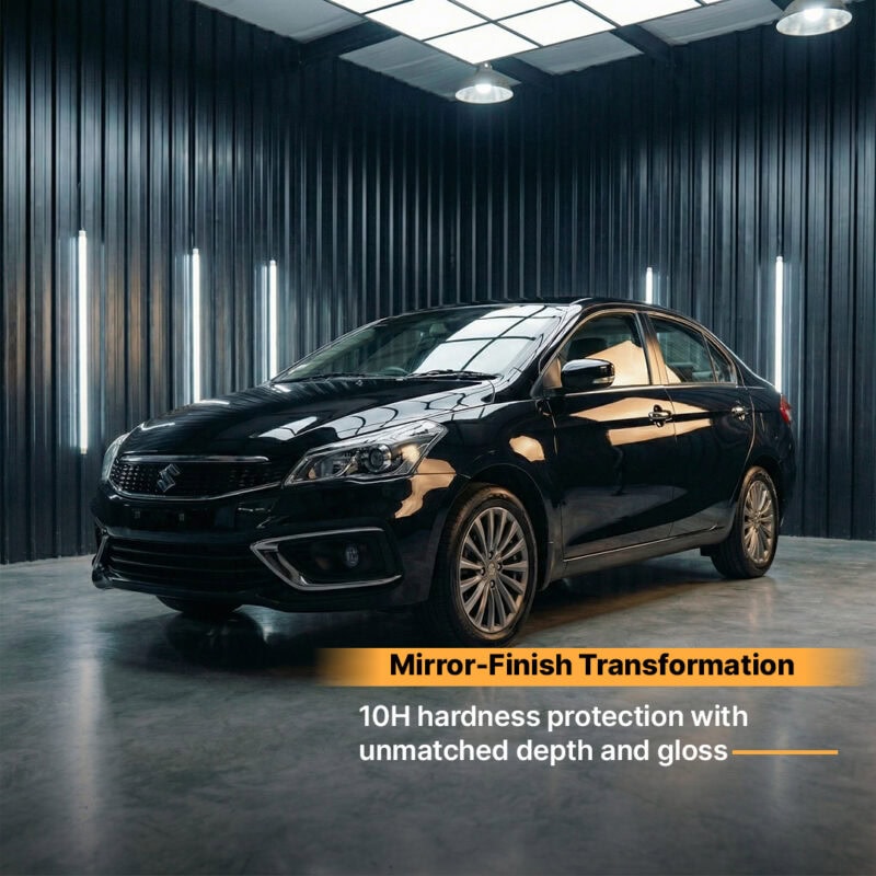 Shiny black car with mirror-finish surface in a modern showroom.